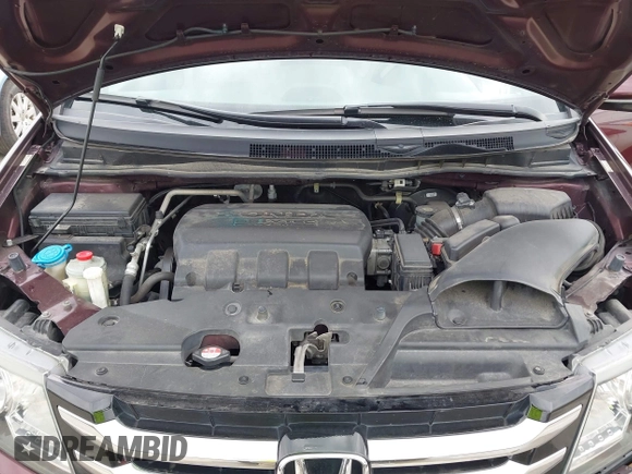 2014 Honda Odyssey Touring with VIN 5FNRL5H9XEB073156, listed as a IAAI auction lot 41990714 with 166,129 mi miles and . Bid and sale history available at DreamBid. Image 10.