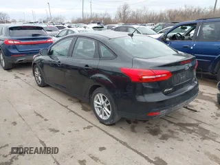 2015 Ford Focus SE with VIN 1FADP3F21FL355666, listed as a IAAI auction lot 41828579 with 110,002 mi miles. Bid and sale history available at carsss.com. Image 3.