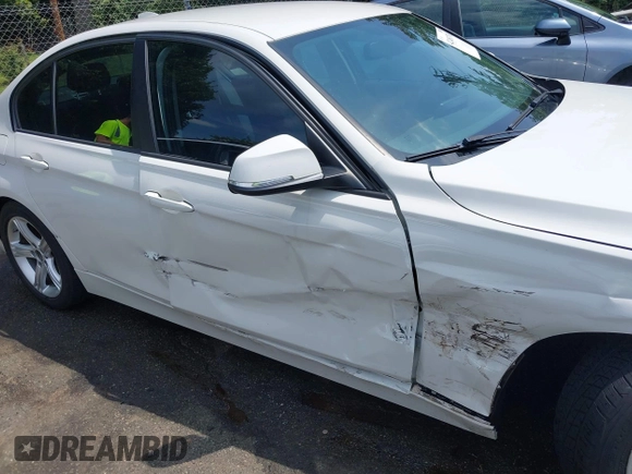 2014 BMW 3 Series 328i with VIN WBA3C1C5XEK107826, listed as a IAAI auction lot 42481701 with 104,151 mi miles and . Bid and sale history available at DreamBid. Image 6.