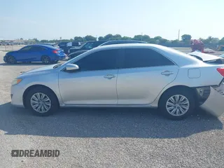 2012 Toyota Camry L z VIN 4T1BF1FK7CU001984, wystawiony jako IAAI lot #41585144 z przebiegiem 20 585 mil mil oraz . Historia ofert i sprzedaży dostępna na DreamBid. Obrazek 14.