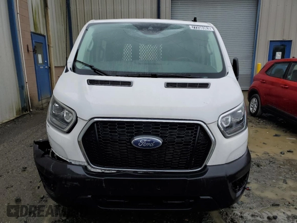 2023 Ford Transit Cargo with VIN 1FTBR1Y87PKA28570, listed as a Copart auction lot 77250383 with Not Provided miles and . Bid and sale history available at DreamBid. Image 5.