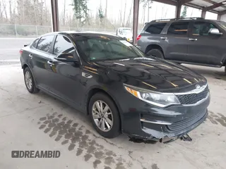 2016 Kia Optima LX z VIN 5XXGT4L39GG099347, wystawiony jako IAAI lot #41895437 z przebiegiem 99 242 mil mil oraz . Historia ofert i sprzedaży dostępna na DreamBid. Obrazek 1.
