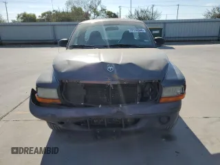 2003 Dodge Dakota with VIN 1D7FL16X13S189963, listed as a Copart auction lot 77114344 with 100,127 mi miles and Salvage Title. Bid and sale history available at carsss.com. Image 5.