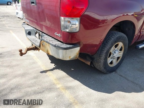 2007 Toyota Tundra SR5 with VIN 5TBDV54117S487602, listed as a IAAI auction lot 42106287 with 214,725 mi miles. Bid and sale history available at carsss.com. Image 6.