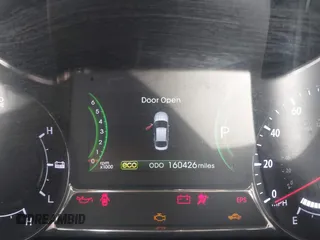 2013 Kia Optima Hybrid EX with VIN KNAGM4AD3D5057701, listed as a IAAI auction lot 42111647 with 160,426 mi miles. Bid and sale history available at carsss.com. Image 7.