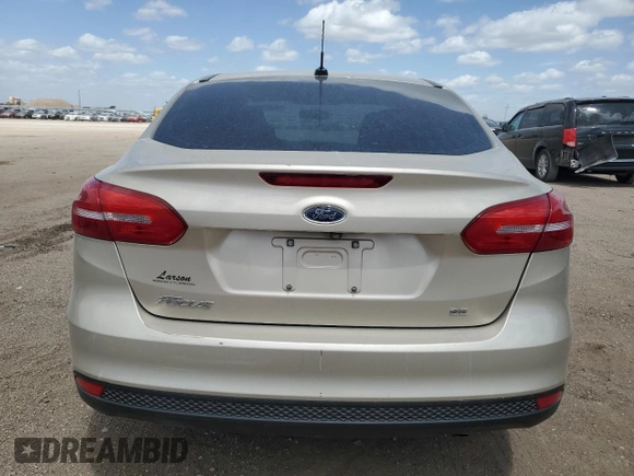 2017 Ford Focus SE with VIN 1FADP3F28HL299535, listed as a Copart auction lot 56958885 with 102,179 mi miles and Clean title. Bid and sale history available at DreamBid. Image 6.