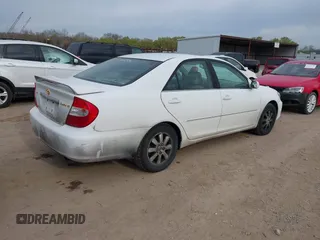 2003 Toyota Camry LE with VIN 4T1BE30K73U227420, listed as a IAAI auction lot 41838940 with 213,470 mi miles and . Bid and sale history available at DreamBid. Image 4.
