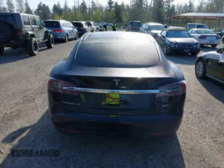 2018 Tesla Model S 75D with VIN 5YJSA1E28JF273809, listed as a IAAI auction lot 42029434 with 85,972 mi miles and . Bid and sale history available at DreamBid. Image 16.