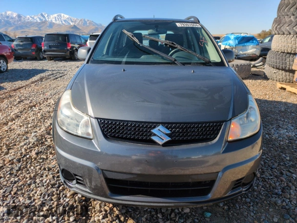 2012 Suzuki SX4 Crossover with VIN JS2YB5A31C6306926, listed as a Copart auction lot 79307604 with 131,762 mi miles and Salvage Title. Bid and sale history available at carsss.com. Image 5.
