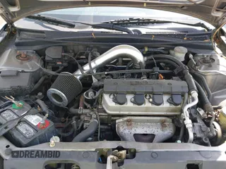 2004 Honda Civic LX with VIN 1HGES16514L020322, listed as a IAAI auction lot 42144118 with 106,190 mi miles. Bid and sale history available at carsss.com. Image 10.