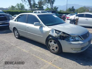 2003 Toyota Avalon XL z VIN 4T1BF28B43U332671, wystawiony jako IAAI lot #42224513 z przebiegiem 303 467 mil mil oraz . Historia ofert i sprzedaży dostępna na DreamBid. Obrazek 1.