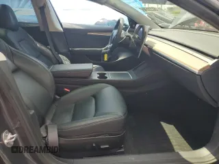 2023 Tesla Model 3 with VIN 5YJ3E1EA8PF704349, listed as a Copart auction lot 60220665 with 18,873 mi miles and Non repairable. Bid and sale history available at DreamBid. Image 7.