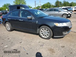 2010 Lincoln MKZ z VIN 3LNHL2GCXAR751058, wystawiony jako Copart lot #58390005 z przebiegiem 61 452 mil mil oraz Szkoda całkowita • Salvage title. Historia ofert i sprzedaży dostępna na DreamBid. Obrazek 4.