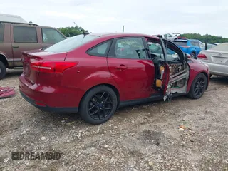 2016 Ford Focus SE with VIN 1FADP3F28GL266971, listed as a IAAI auction lot 42366561 with 67,390 mi miles and . Bid and sale history available at DreamBid. Image 4.