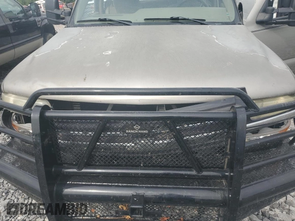 2001 Chevrolet Silverado 3500 LS z VIN 1GCJC33121F182199, wystawiony jako Copart lot #72530404 z przebiegiem 252 199 mil mil oraz Szkoda całkowita • Salvage title. Historia ofert i sprzedaży dostępna na DreamBid. Obrazek 13.