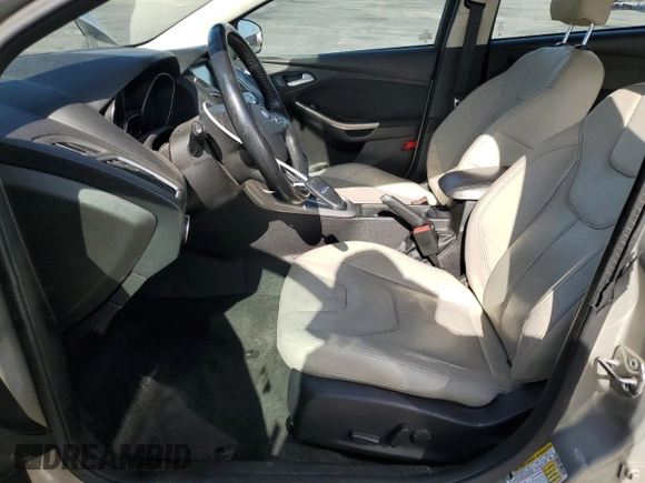 2015 Ford Focus Titanium с VIN 1FADP3J28FL288037, выставлен на аукционе Copart как лот 56972865 с пробегом 75 703 миль миль и Списание • Salvage title. История ставок и продаж доступна на DreamBid. Изображение 7.