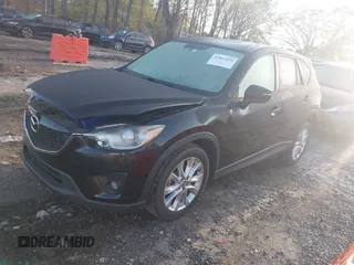 2015 Mazda CX-5 Grand Touring with VIN JM3KE4DY6F0513173, listed as a IAAI auction lot 41867030 with 93,770 mi miles. Bid and sale history available at carsss.com. Image 2.