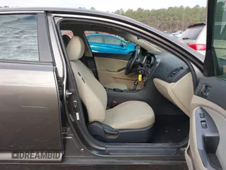 2015 Kia Optima LX with VIN 5XXGM4A74FG401418, listed as a IAAI auction lot 41899008 with 125,812 mi miles. Bid and sale history available at carsss.com. Image 5.