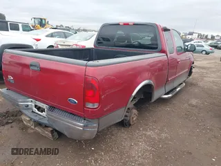 2002 Ford F-150 XL with VIN 1FTRX17W72NB88475, listed as a IAAI auction lot 41574244 with 200,396 mi miles. Bid and sale history available at carsss.com. Image 4.