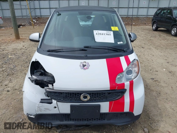 2014 Smart fortwo Pure with VIN WMEEJ3BA2EK733819, listed as a IAAI auction lot 42041305 with 69,018 mi miles and . Bid and sale history available at DreamBid. Image 13.