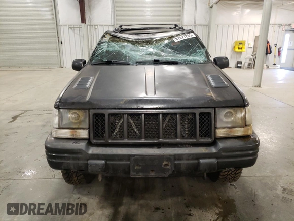 1998 Jeep Grand Cherokee Limited with VIN 1J4GZ88Z3WC165659, listed as a Copart auction lot 87527255 with 203,860 mi miles and Salvage Title. Bid and sale history available at carsss.com. Image 5.