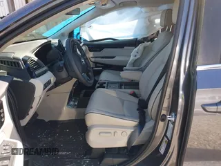 2025 Honda Odyssey Touring z VIN 5FNRL6H84SB028769, wystawiony jako IAAI lot #41856080 z przebiegiem Nie podano mil oraz . Historia ofert i sprzedaży dostępna na DreamBid. Obrazek 5.