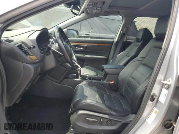 2018 Honda CR-V Touring z VIN 7FARW2H95JE012947, wystawiony jako Copart lot #64779925 z przebiegiem 20 561 mil mil oraz Szkoda całkowita • Salvage title. Historia ofert i sprzedaży dostępna na DreamBid. Obrazek 7.