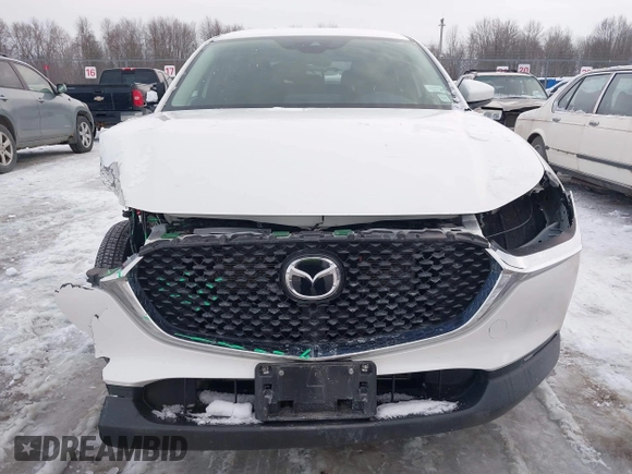 2021 Mazda CX-30 S with VIN 3MVDMBAL9MM221639, listed as a IAAI auction lot 41545920 with 57,239 mi miles and . Bid and sale history available at carsss.com. Image 6.