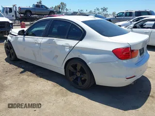 2014 BMW 3 Series 328i with VIN WBA3A5G55ENP31569, listed as a IAAI auction lot 42218428 with 151,927 mi miles and . Bid and sale history available at DreamBid. Image 3.