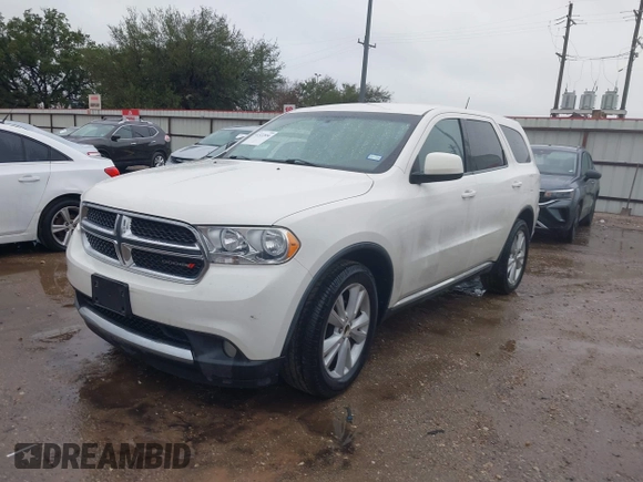 2012 Dodge Durango SXT with VIN 1C4RDHAG5CC308449, listed as a IAAI auction lot 41522856 with 111,284 mi miles and . Bid and sale history available at DreamBid. Image 2.