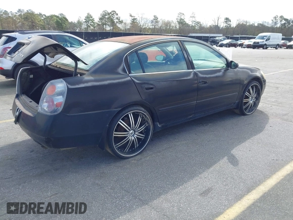 2002 Nissan Altima S with VIN 1N4AL11D52C178433, listed as a IAAI auction lot 41792610 with 216,659 mi miles. Bid and sale history available at carsss.com. Image 4.