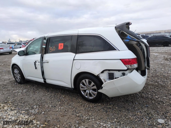 2014 Honda Odyssey EX-L with VIN 5FNRL5H67EB067093, listed as a Copart auction lot 87693205 with 0 mi miles and Salvage Title. Bid and sale history available at carsss.com. Image 2.