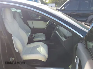 2018 Tesla Model S 75D with VIN 5YJSA1E45JF269282, listed as a IAAI auction lot 42404695 with 251,795 mi miles and . Bid and sale history available at DreamBid. Image 5.