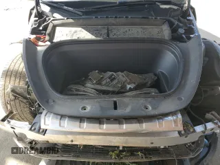2024 Tesla Model Y Long Range z VIN 7SAYGDEE1RA247973, wystawiony jako Copart lot #45679205 z przebiegiem 22 739 mil mil oraz Szkoda całkowita • Salvage title. Historia ofert i sprzedaży dostępna na DreamBid. Obrazek 13.