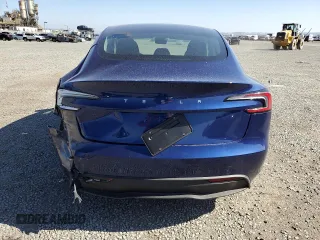 2025 Tesla Model 3 Long Range with VIN 5YJ3E1EA6SF935839, listed as a Copart auction lot 57665785 with 5,996 mi miles and Salvage title. Bid and sale history available at DreamBid. Image 6.