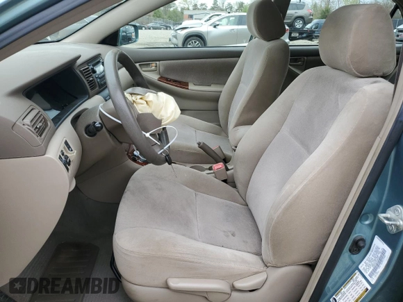 2006 Toyota Corolla CE with VIN 1NXBR32E26Z585721, listed as a Copart auction lot 52023485 with 102,856 mi miles and Salvage Title. Bid and sale history available at DreamBid. Image 7.