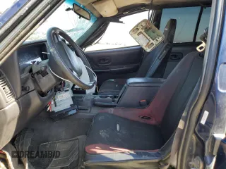 2000 Jeep Cherokee with VIN 1J4FF48S3YL126931, listed as a Copart auction lot 57593305 with Not provided miles and Non repairable. Bid and sale history available at DreamBid. Image 7.
