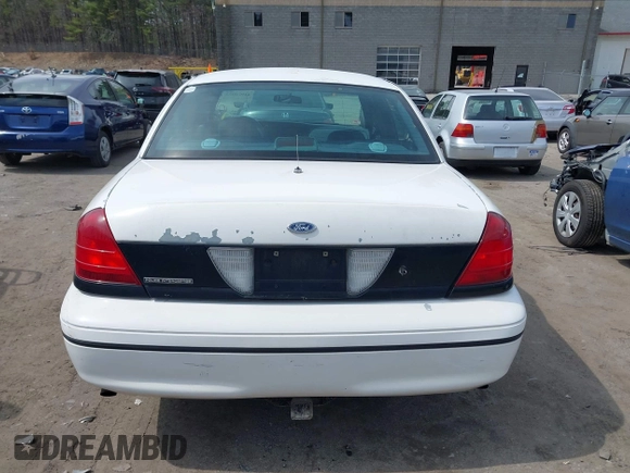 2000 Ford Crown Victoria Police Interceptor z VIN 2FAFP71W6YX169248, wystawiony jako IAAI lot #41974053 z przebiegiem 230 658 mil mil oraz . Historia ofert i sprzedaży dostępna na DreamBid. Obrazek 16.