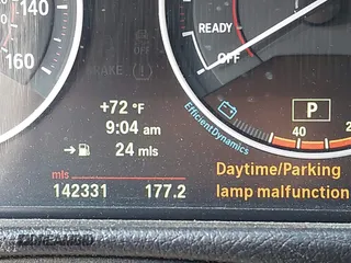 2013 BMW 3 Series 335i xDrive with VIN WBA3B9C54DF587421, listed as a IAAI auction lot 42165857 with 142,331 mi miles. Bid and sale history available at carsss.com. Image 15.