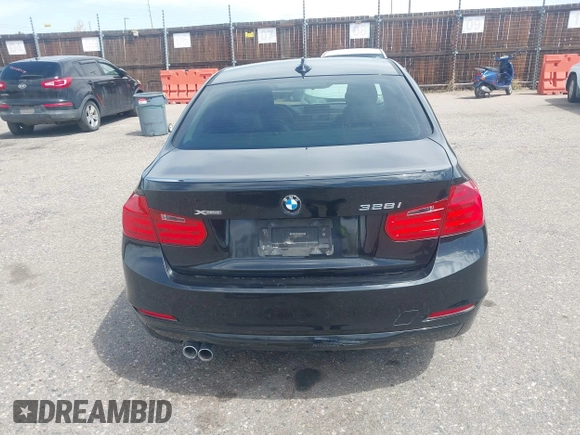 2014 BMW 3 Series 328i xDrive with VIN WBA3B3C56EJ981322, listed as a IAAI auction lot 42104530 with 104,376 mi miles. Bid and sale history available at carsss.com. Image 16.