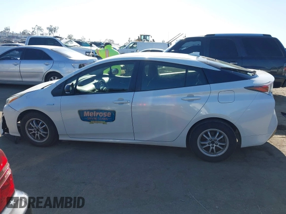 2016 Toyota Prius Two with VIN JTDKBRFUXG3001716, listed as a IAAI auction lot 42009763 with 177,132 mi miles and . Bid and sale history available at carsss.com. Image 14.
