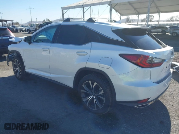 2022 Lexus RX with VIN 2T2HZMAA1NC232512, listed as a IAAI auction lot 41375711 with 27,599 mi miles. Bid and sale history available at carsss.com. Image 3.