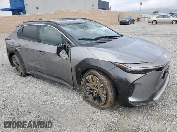 2024 Toyota bZ4X XLE with VIN JTMAAAAA8RA045760, listed as a Copart auction lot 50996385 with 3,833 mi miles and Salvage Title. Bid and sale history available at DreamBid. Image 4.