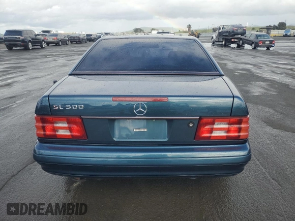 1999 Mercedes-Benz SL 500 with VIN WDBFA68F7XF177749, listed as a Copart auction lot 51460545 with 140,028 mi miles and Clean title. Bid and sale history available at DreamBid. Image 6.