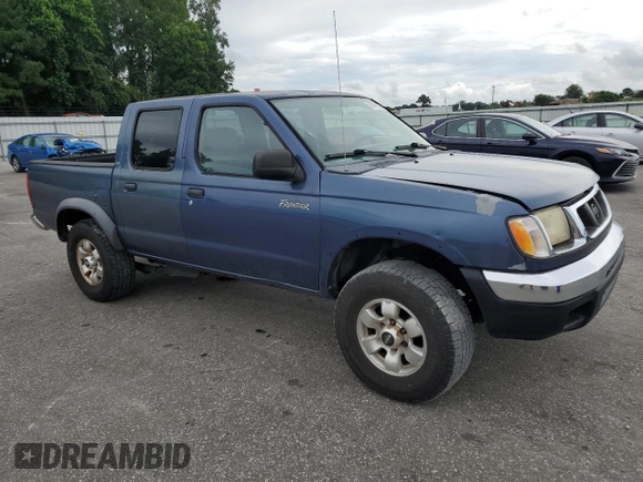 2000 Nissan Frontier XE with VIN 1N6ED27T3YC343320, listed as a Copart auction lot 64883025 with 168,047 mi miles and Clean title. Bid and sale history available at DreamBid. Image 4.