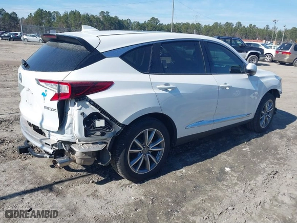 2020 Acura RDX w/Technology Pkg with VIN 5J8TC1H52LL006185, listed as a IAAI auction lot 41457828 with 59,998 mi miles. Bid and sale history available at carsss.com. Image 4.