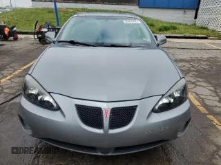 2007 Pontiac Grand Prix z VIN 2G2WP552171223907, wystawiony jako Copart lot #55470435 z przebiegiem 106 754 mil mil oraz Tytuł czysty. Historia ofert i sprzedaży dostępna na DreamBid. Obrazek 5.