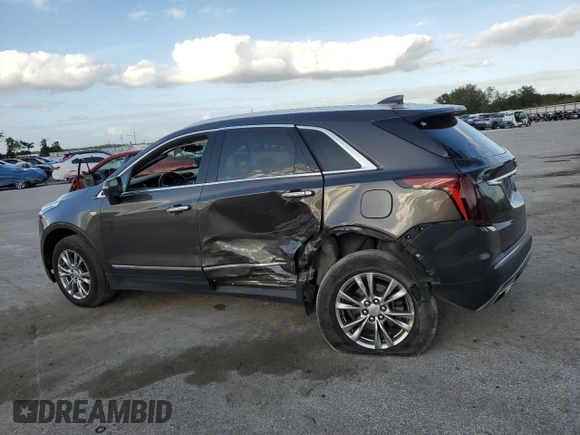 2020 Cadillac XT5 Premium Luxury FWD with VIN 1GYKNCRSXLZ126926, listed as a Copart auction lot 51703605 with 146,576 mi miles and Salvage Title. Bid and sale history available at carsss.com. Image 2.