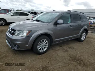 2013 Dodge Journey SXT with VIN 3C4PDDBG0DT614978, listed as a Copart auction lot 50910075 with 127,610 mi miles and Clean Title. Bid and sale history available at DreamBid. Image 1.