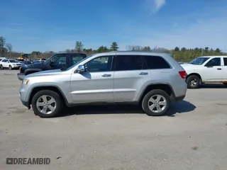 2011 Jeep Grand Cherokee Limited with VIN 1J4RR5GG8BC556064, listed as a IAAI auction lot 42014688 with 151,706 mi miles. Bid and sale history available at carsss.com. Image 14.